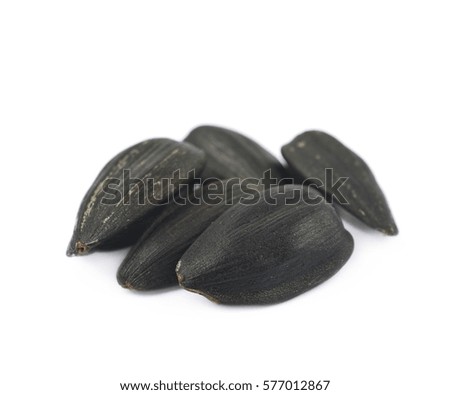 Pile of sunflowers seeds isolated over the white background