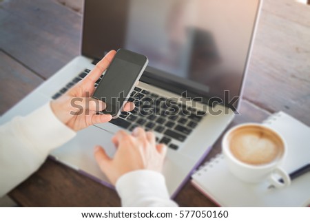 Woman surfing the internet with wireless gadget, stock photo