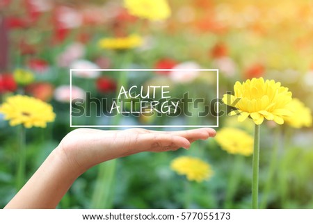 Acute Allergy words on women hand. nature as background