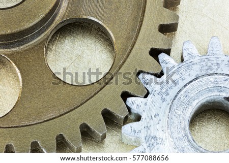 industrial background with machine metal cogwheels closeup