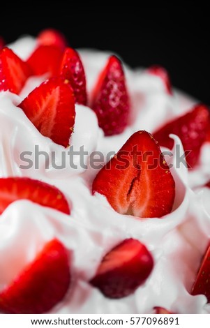 Summer dessert: strawberries and cream  close up
