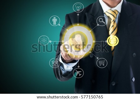 BUSINESS MAN TOUCHING ON CENTER DIGITAL BUTTON LINK TO WEB BUTTON.