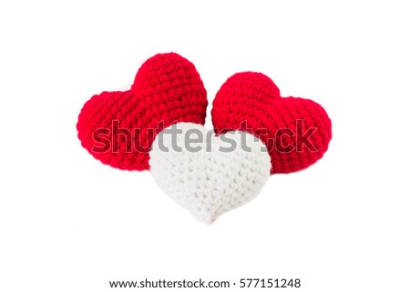 One white and Two Red shape of heart made from red yarn isolated on white background, Valentine's Day. Symbol of love.