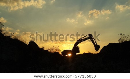 silhouette photo of backhoe excavator.