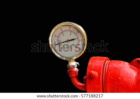 water Circular industrial pressure gauges on black background