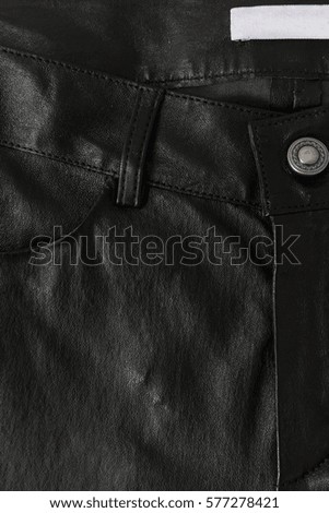 Label on the Black Leather Cloth with Buttons