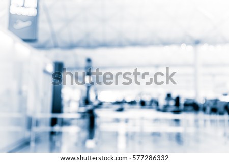 Abstract blur airport interior for background at Hong Kong with blue tone