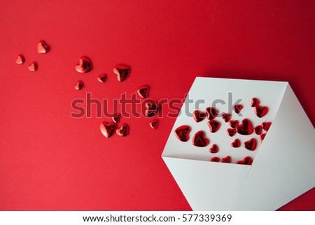 Hearts fly out from the envelope. Love Letter. Background Valentine's Day