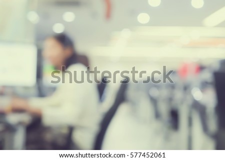 blurred group of employee working as call centre in operation room background concept. Royalty-Free Stock Photo #577452061