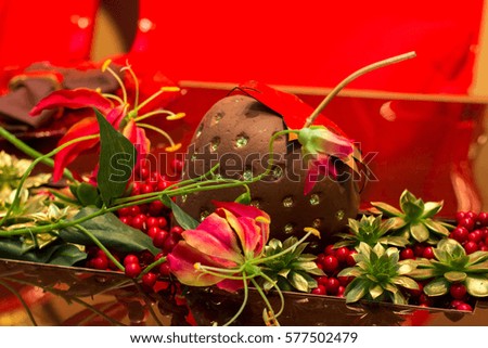 Wedding decorations in red color. A decorated wedding dining table 