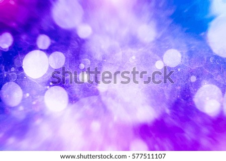 abstract blurred of blue and silver glittering shine bulbs lights background.blur of Christmas wallpaper decorations concept.xmas holiday festival backdrop:sparkle circle lit celebrations display.