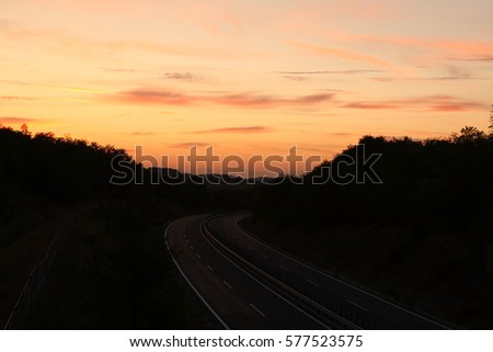Amazing colourful sunset with road, Vipava valley, Slovenia
