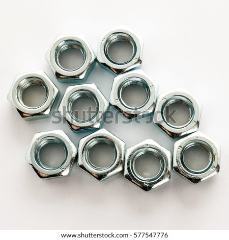 Metal nut on a white background