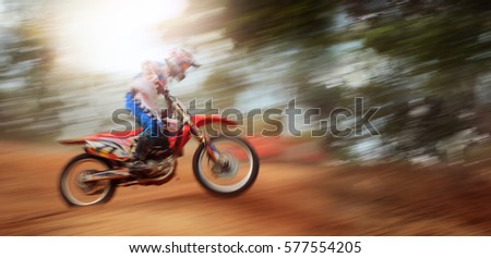 Motion blur of motocross Bike Jump,camera panning technique.