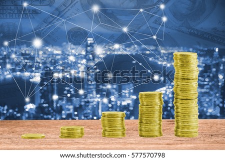 Money pile coin on network connection on blur city background