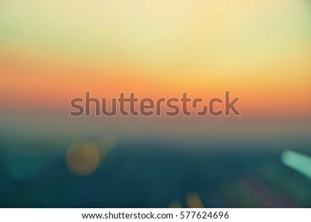 Hope Concept; blurred light abstract on evening sunset beach near ocean for prayer theme decoration