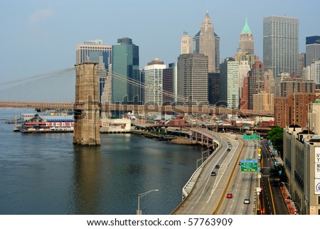 New York City skyline with Brooklyn Bridge and FDR Drive.