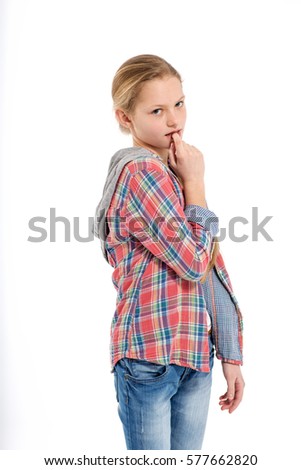 Portrait of young cute shy teenage girl on white background