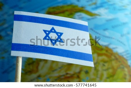 Israel flag with a globe map as a background macro