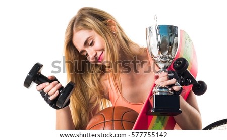 Sport girl with a lot of sport items