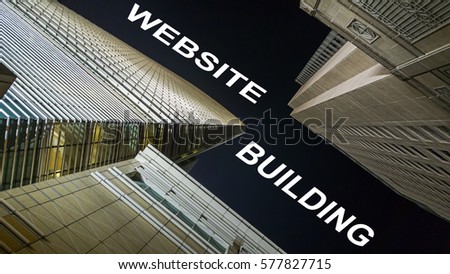 Modern buildings from low angle at night with text website building.