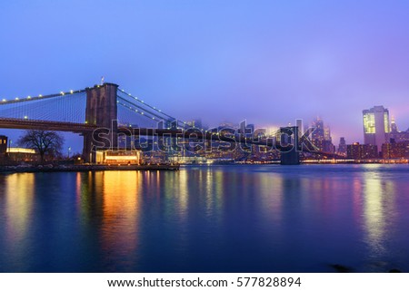 NEW YORK - JAN 22: Booklyn Bride and Manhattan at twilight on Jan 22, 2017 in New York, USA.