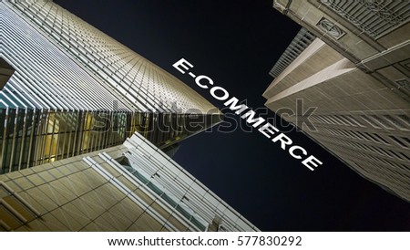 Modern buildings from low angle at night with E-commerce.
