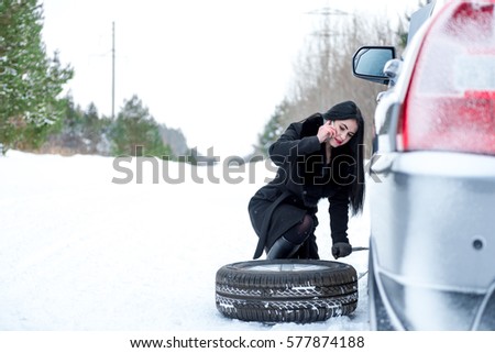 Winter car breakdown - woman call for help, road assistance