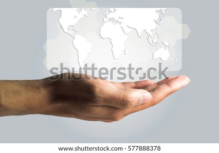Business and Technology concept, a male hand produce the virtual screen showing the world map.
