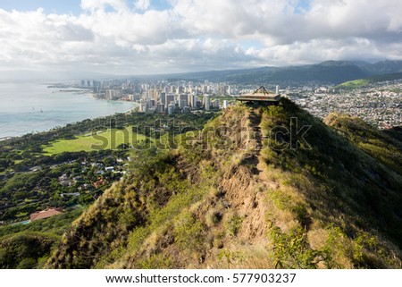 Skyline view of Waikiki Beach and Honolulu from Diamond Head in Oahu, Hawaii. Royalty-Free Stock Photo #577903237