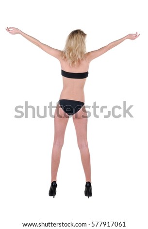 Beautiful young woman l. Rear view. Isolated over white.
