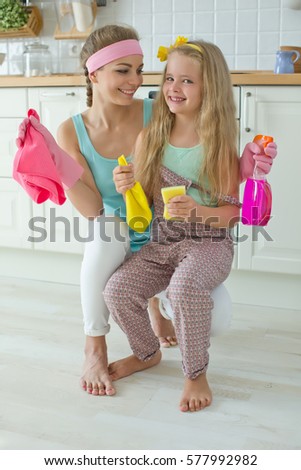 Woman and child cleaning