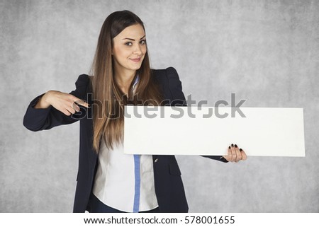 business woman pointing to the place on your advertising