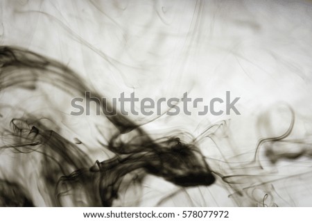 Background black ink dissolved in water