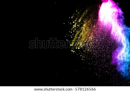 abstract powder splatted on black background,Freeze motion of color powder exploding/throwing color powder, multicolored glitter texture.