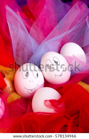 Easter eggs with funny faces on colorful and bright background. Emoji funny egg.