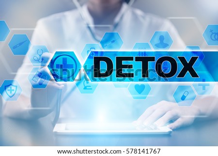 Medical doctor using tablet PC with detox medical concept. Royalty-Free Stock Photo #578141767