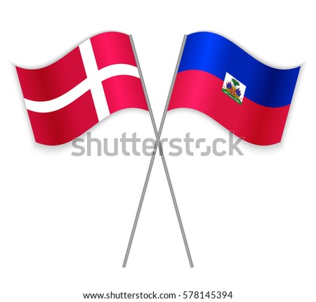 Danish and Haitian crossed flags. Denmark combined with Haiti isolated on white. Language learning, international business or travel concept.