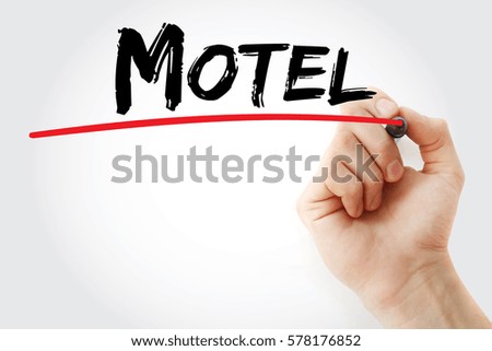 Hand writing motel with marker, concept background