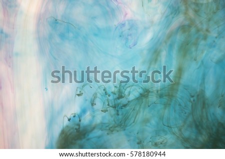 Background multicolored ink dissolved in water