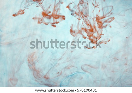 Background blue and red inks dissolved in water
