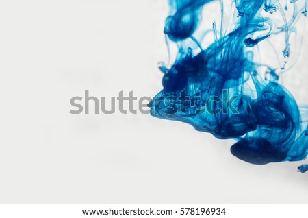 Background blue ink dissolved in water
