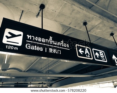 Airport signboard departure gate and distance to the gate