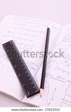 Calculator on notepad with calculations
