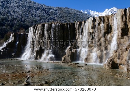 Waterfall nearby the Jade Dragon Mountain, Lijiang, China