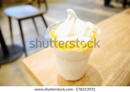 Picture blurred  for background abstract and can be illustration to article of ice-cream on table in cafe