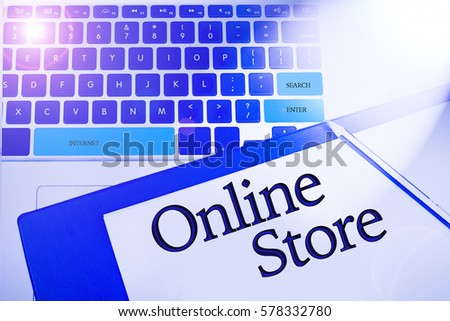 Online store word in business concepts, technology background in laptop and notepad