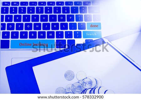 Online banking word in business concepts, technology background in laptop and notepad