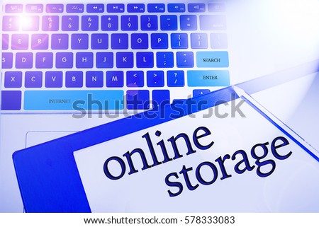 Online storage word in business concepts, technology background in laptop and notepad