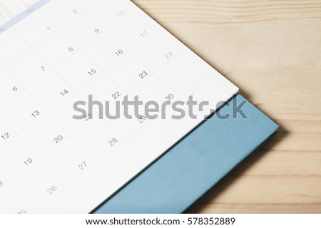 Calendar on the wooden background